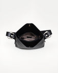 Black leather bag with a strap on a white background