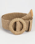 Beige woven belt with a large decorative buckle on a light gray background