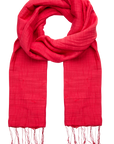 Red scarf with fringes on a white background