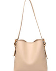 Beige handbag with a shoulder strap on a white background