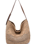 Woven handbag with a brown strap on a white background