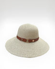 Beige straw hat with a brown leather band on a white background