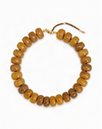 Necklace with brown beads on a white background