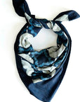 Navy blue floral patterned headscarf on a white background