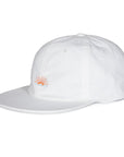White cap with a small logo on a white background