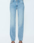 Light blue jeans worn by a person on a white background