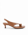 Brown sandal with a high heel on a white background