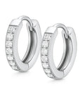Pair of silver hoop earrings with embedded diamonds on a white background