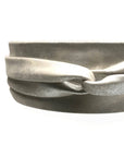 Silver wrap belt on a white background