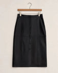 Black skirt on a wooden hanger against a white background