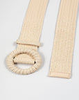 Beige woven belt with a round buckle on a light gray background