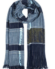 Plaid scarf with blue and white pattern on a white background