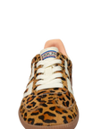 Leopard print sneaker with white laces on a white background