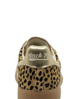 A single low-top sneaker shown from the back, featuring a leopard print upper with a metallic gold heel counter and a tan sole.