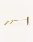 Gold sunglasses on a white background