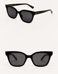 Pair of tortoiseshell sunglasses with brown lenses on a white background