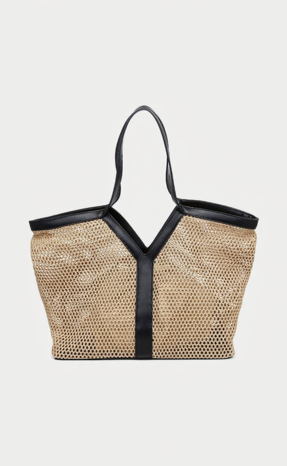 Woven handbag with black straps on a white background