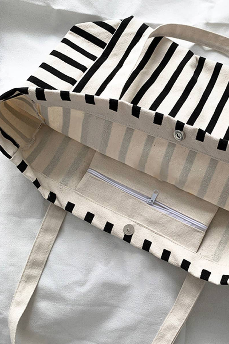 Striped bag with a zipper pocket on a white background