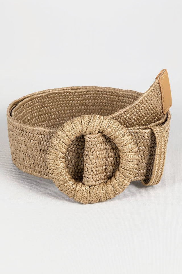 Beige woven belt with a large decorative buckle on a light gray background