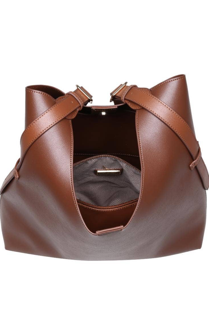 Brown leather handbag on a white background