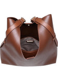 Brown leather handbag on a white background