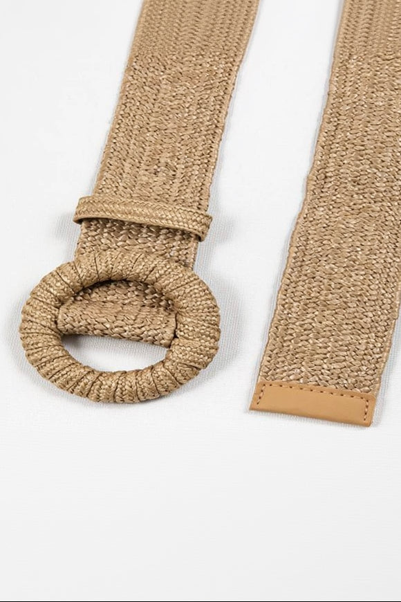 Beige textured belt with a knot on a white background