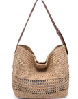 Woven handbag with a brown strap on a white background