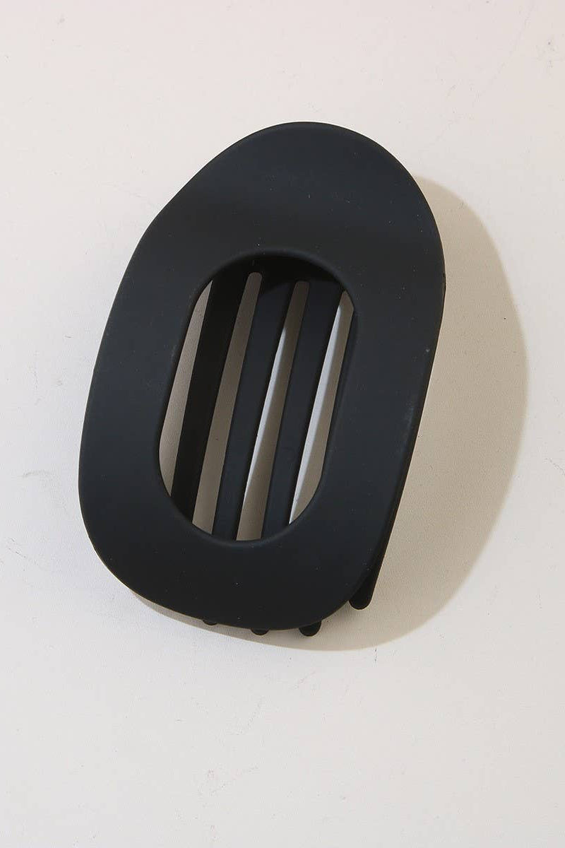 Black rubber grommet on a white background