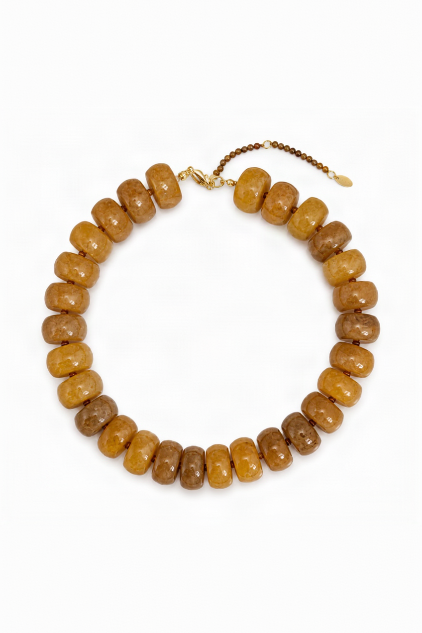 Necklace with brown beads on a white background