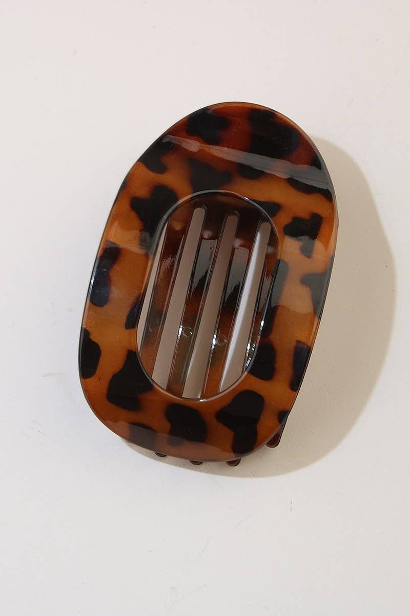 Tortoiseshell hair clip on a white background