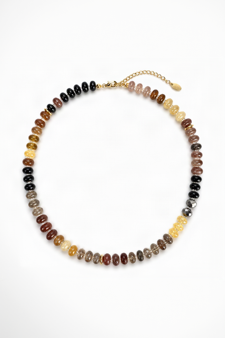 Necklace with multicolored beads on a white background