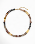 Necklace with multicolored beads on a white background