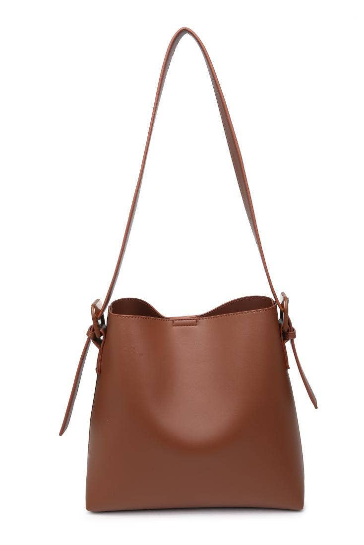 Brown leather handbag with a strap on a white background