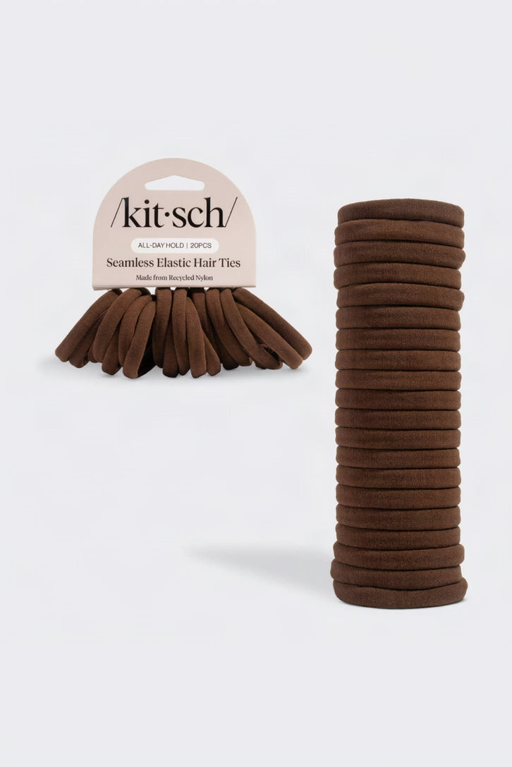 A pack of Kit Sch Seamless Elastic Hair Ties in a medium brown color, shown with one half fanned out on the left and a tall stack of 20 pieces on the right, against a light gray background.
