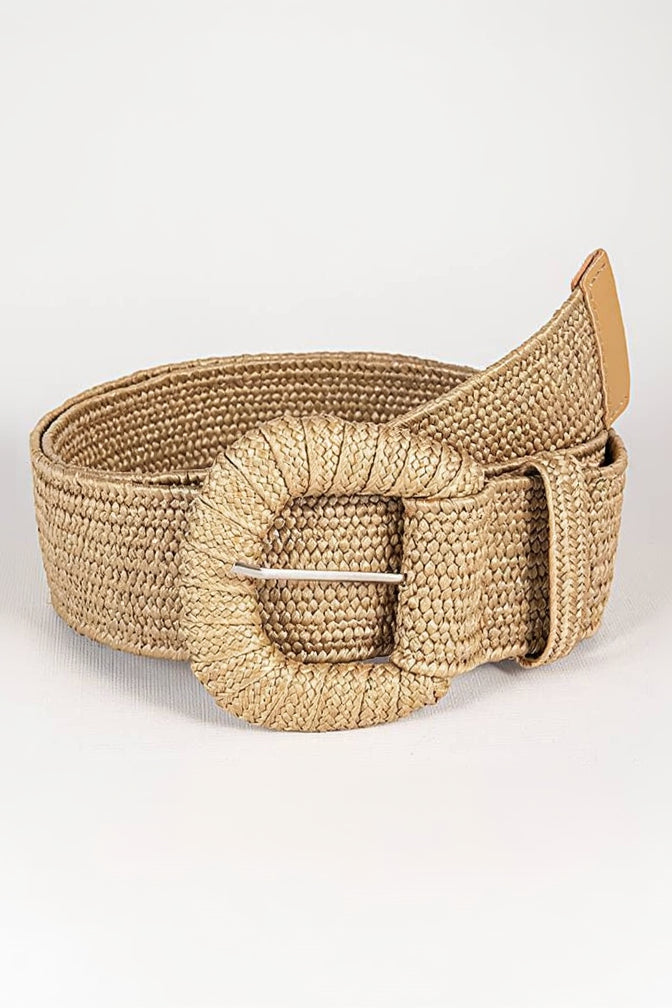 Beige woven belt with a silver buckle on a light gray background
