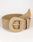 Beige woven belt with a silver buckle on a light gray background