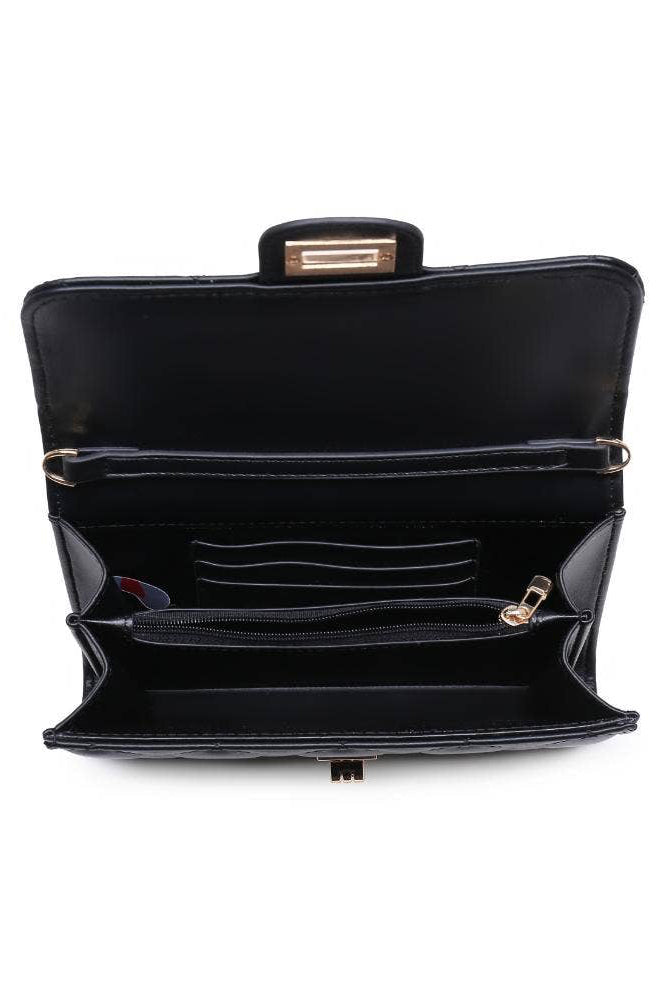 Black handbag with open interior on a white background