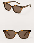 Tortoiseshell sunglasses with brown lenses on a white background