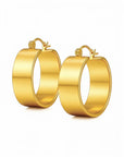Pair of gold hoop earrings on a white background