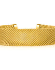 Gold mesh bracelet on a white background