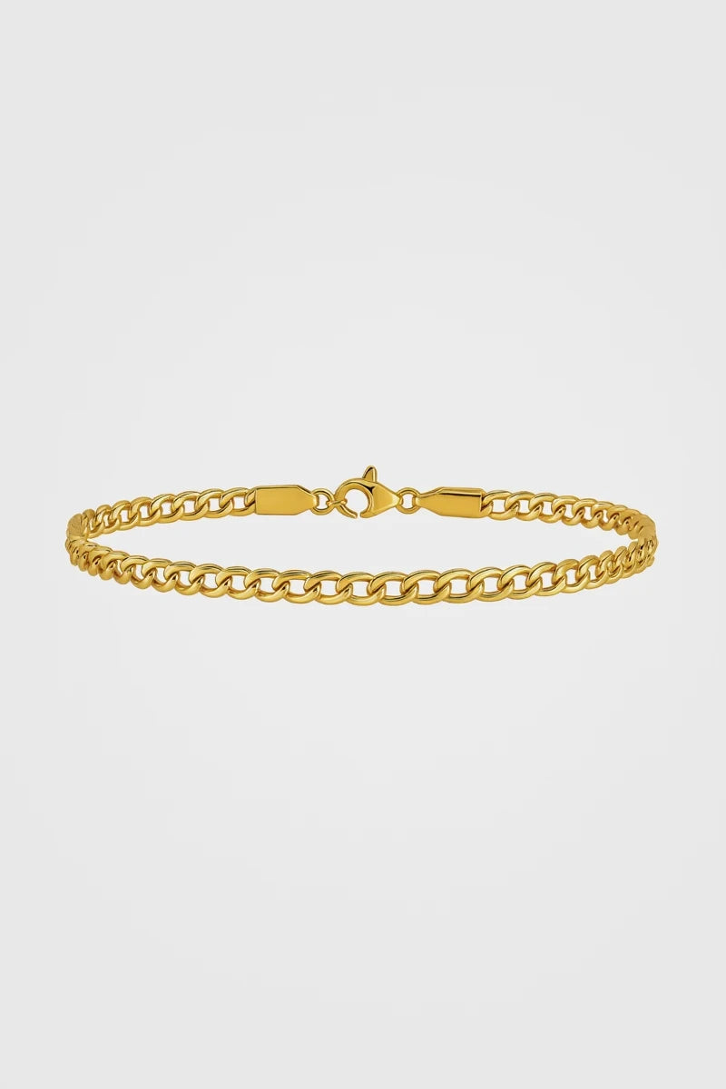 Gold chain bracelet on a white background