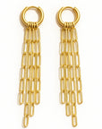 Gold chain earrings on a white background