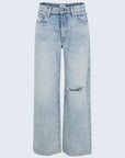 Light blue jeans with a slight distressed look on a light gray background