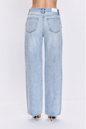 Light blue jeans on a white background