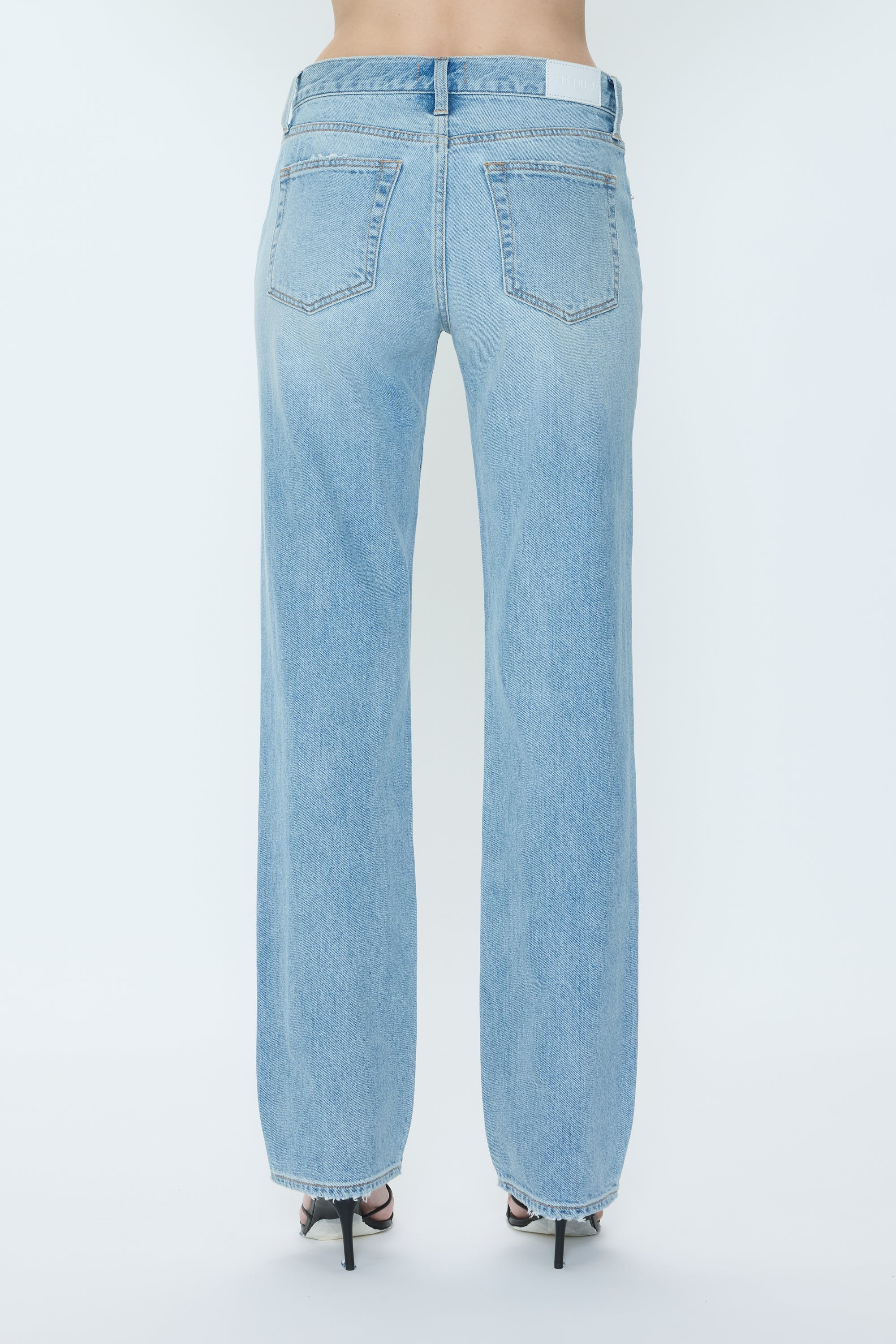 Light blue jeans on a white background