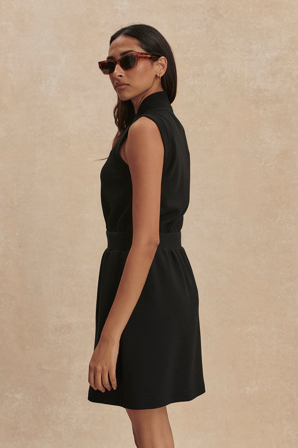 black zip dress HOODIE UP (BLACK) / XS / Short accentuating your silhouette with its sleek and sophisticated style.Crafted from high Louisa Short Sleeve Zip Through