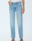 Light blue jeans worn by a person on a white background
