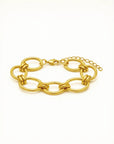 Gold chain bracelet on a white background