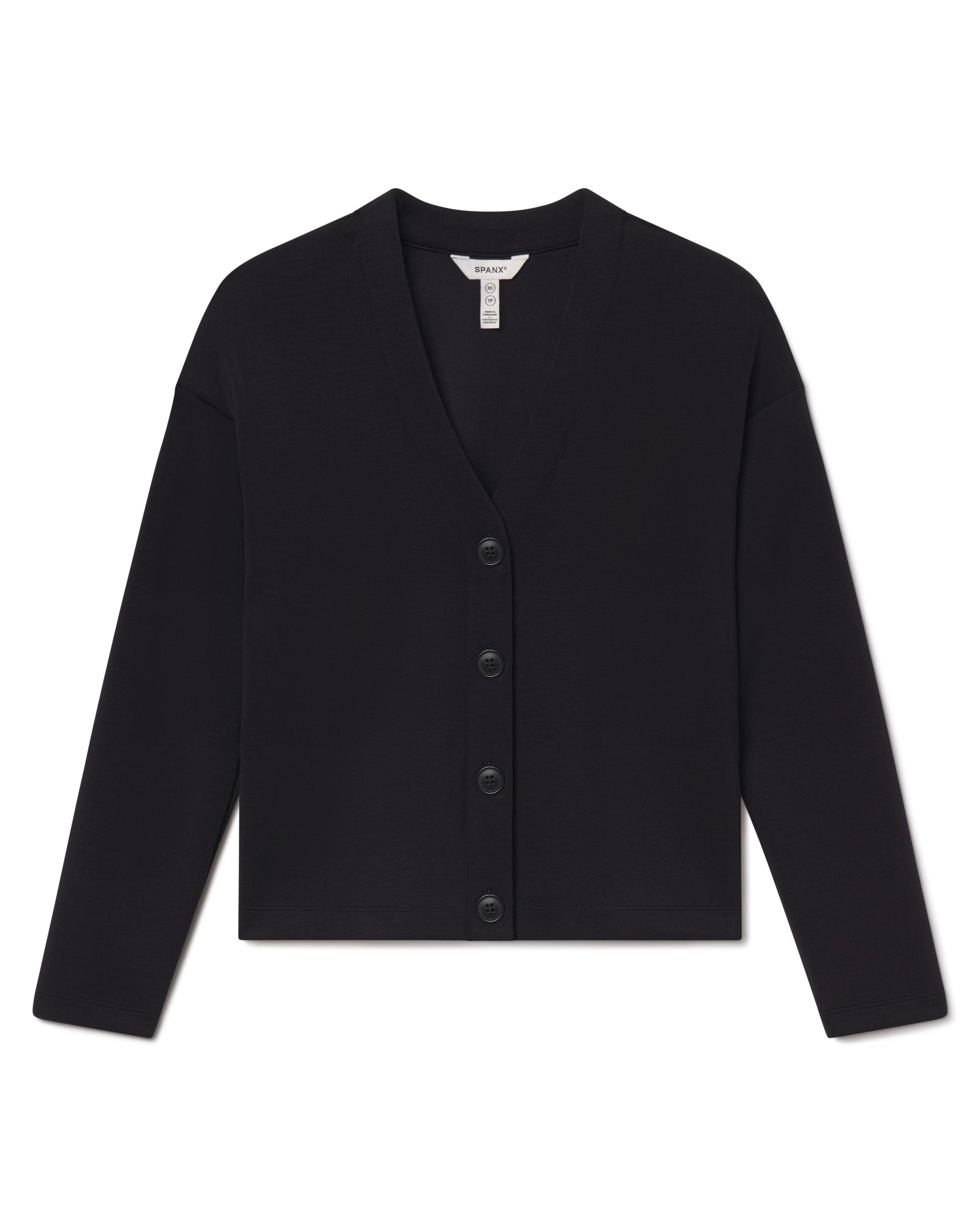 Black cardigan on a white background