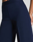 Navy blue pants on a plain background